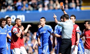 Arsenal's Kieran Gibbs is sent off by referee Andre Marriner against Chelsea in the Premier League