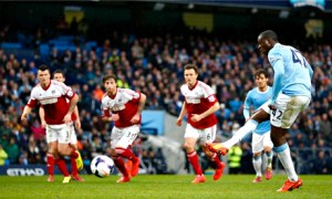 Manchester City's Yaya Touré scores the first against Fulham in the Premier League at the Etihad