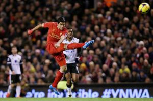 Luis-Suarez-of-Liverpool-scores-his-first-goal-2946543