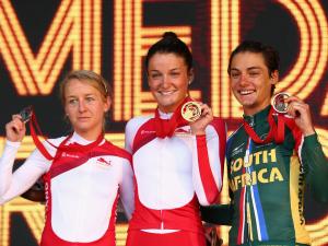 emma_pooley_of_england__lizzie_armitstead_of_england_and_ashleigh_pasio_of_south_africa_celebrates_with_their_medals_after_the_women_s_cycling_road_race_N2