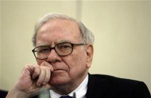 U.S. Investor Warren Buffett listens to a question during a news conference in Madrid