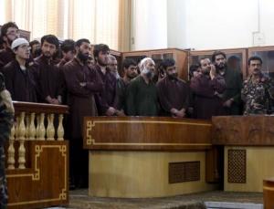 Defendants attend their trial at the Primary Court in Kabul
