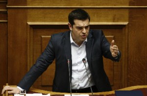 Alexis Tsipras, Greece's prime minister, speaks to lawmakers in Athens, Greece, on Monday, March 30, 2015. "The Greek government's strategy of isolating Germany and getting a majority of other euro-zone members to support another package against vague promises and no coherent reform plan has failed spectacularly," Erik Nielsen, global chief economist at UniCredit Bank AG, said in a note on Sunday. Photographer: Kostas Tsironis/Bloomberg *** Local Caption *** Alexis Tsipras