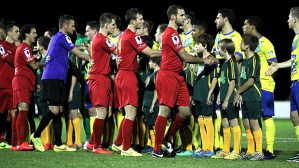 NEWCASTLE, AUSTRALIA - JULY 29: Teams shake hands before the game during the FFA Cup match between Broadmeadow and Brisbane Strikers at Wanderers Oval on July 29, 2014 in Newcastle, Australia. (Photo by Ashley Feder/Getty Images)
