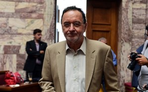 Greece's Energy Minister and head of the Syriza party, Panagiotis Lafazanisarrives arrives for the Syriza party's parliamentary group meeting at the Greek Parliament in Athens on July 15, 2015.  Greece gears up for a crucial parliamentary vote on draconian reforms demanded by eurozone creditors in exchange for a huge new bailout, in what could be Prime Minister Alexis Tsipras's toughest political test yet. AFP PHOTO/ LOUISA GOULIAMAKILOUISA GOULIAMAKI/AFP/Getty Images