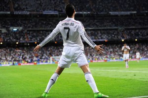 MADRID, SPAIN - OCTOBER 05:  Cristiano Ronaldo of Real Madrid celebrates after scoring his team's 5th and his third goal against Club Athletic during the La Liga match between Real Madrid CF and Athletic Club at Estadio Santiago Bernabeu on October 5, 2014 in Madrid, Spain.  (Photo by Denis Doyle/Getty Images)