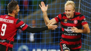 MELBOURNE, AUSTRALIA - NOVEMBER 13:  Mitch Nichols of the Wanderers celebrates a goal with Frederico Piovaccari (L) during the round six A-League match between Melbourne City FC and the Western Sydney Wanderers at AAMI Park on November 13, 2015 in Melbourne, Australia.  (Photo by Michael Dodge/Getty Images)