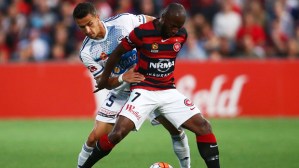 SYDNEY, AUSTRALIA - DECEMBER 12:  Romeo Castelen of the Wanderers is challenged by Daniel Georgievski of Melbourne Victory during the round 10 A-League match between the Western Sydney Wanderers and Melbourne Victory at Pirtek Stadium on December 12, 2015 in Sydney, Australia.  (Photo by Matt King/Getty Images)
