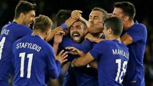 MELBOURNE, AUSTRALIA - JUNE 07: Giannis Maniatis of Greece is congratulated by his teammates after kicking a goal from half way during the International Friendly match between the Australian Socceroos and Greece at Etihad Stadium on June 7, 2016 in Melbourne, Australia. (Photo by Scott Barbour/Getty Images)